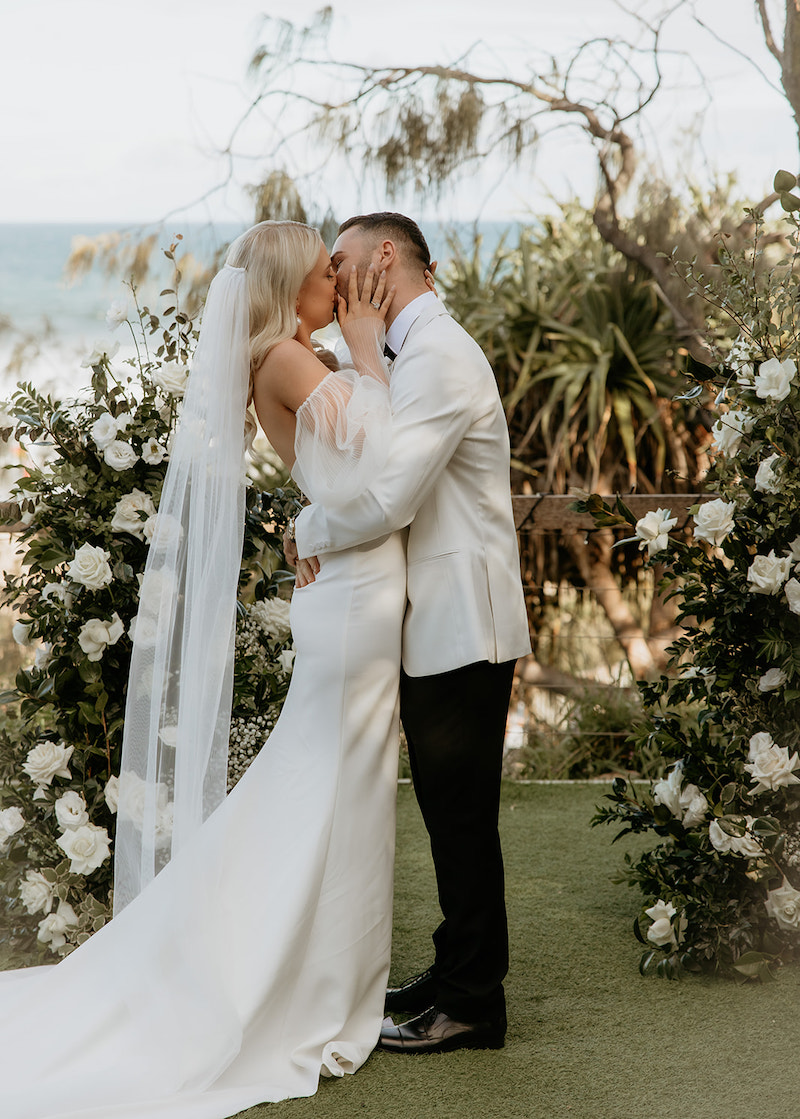 Amy and Mitchell Wedding Kiss with Marriage Celebrant Sunshine Beach Emma Homewood